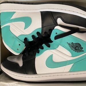Air Jordan Sneakers in Black, White, and Teal